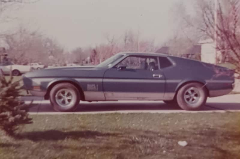 Vintage image of 72 Ford Mustang in a driveway